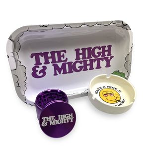 picture of white metal tray that reads the high & mighty, purple metal grinder and white ashtray