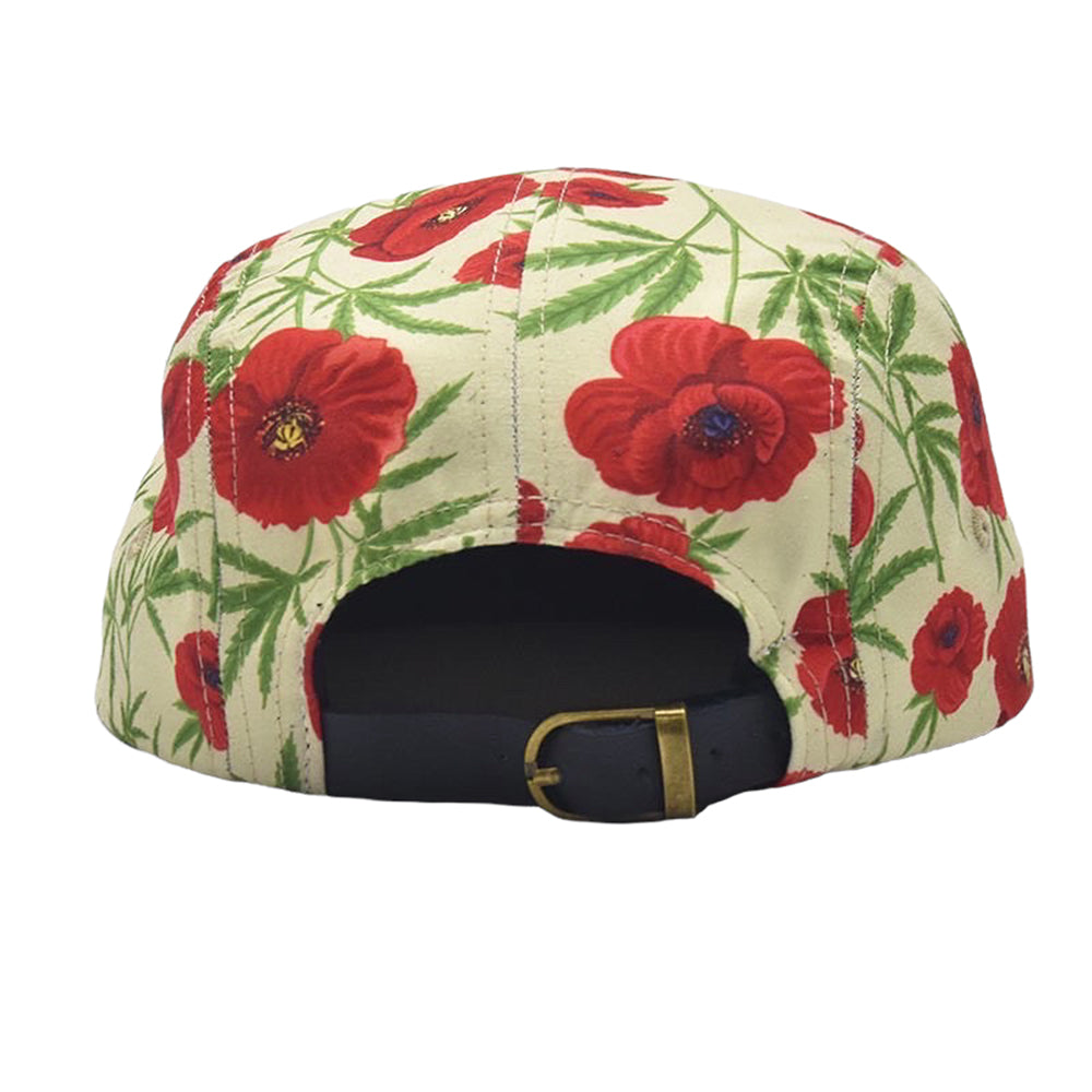 cream hat with red poppies and green marijuana leaqves on it. Front has green label that reads the high & mighty